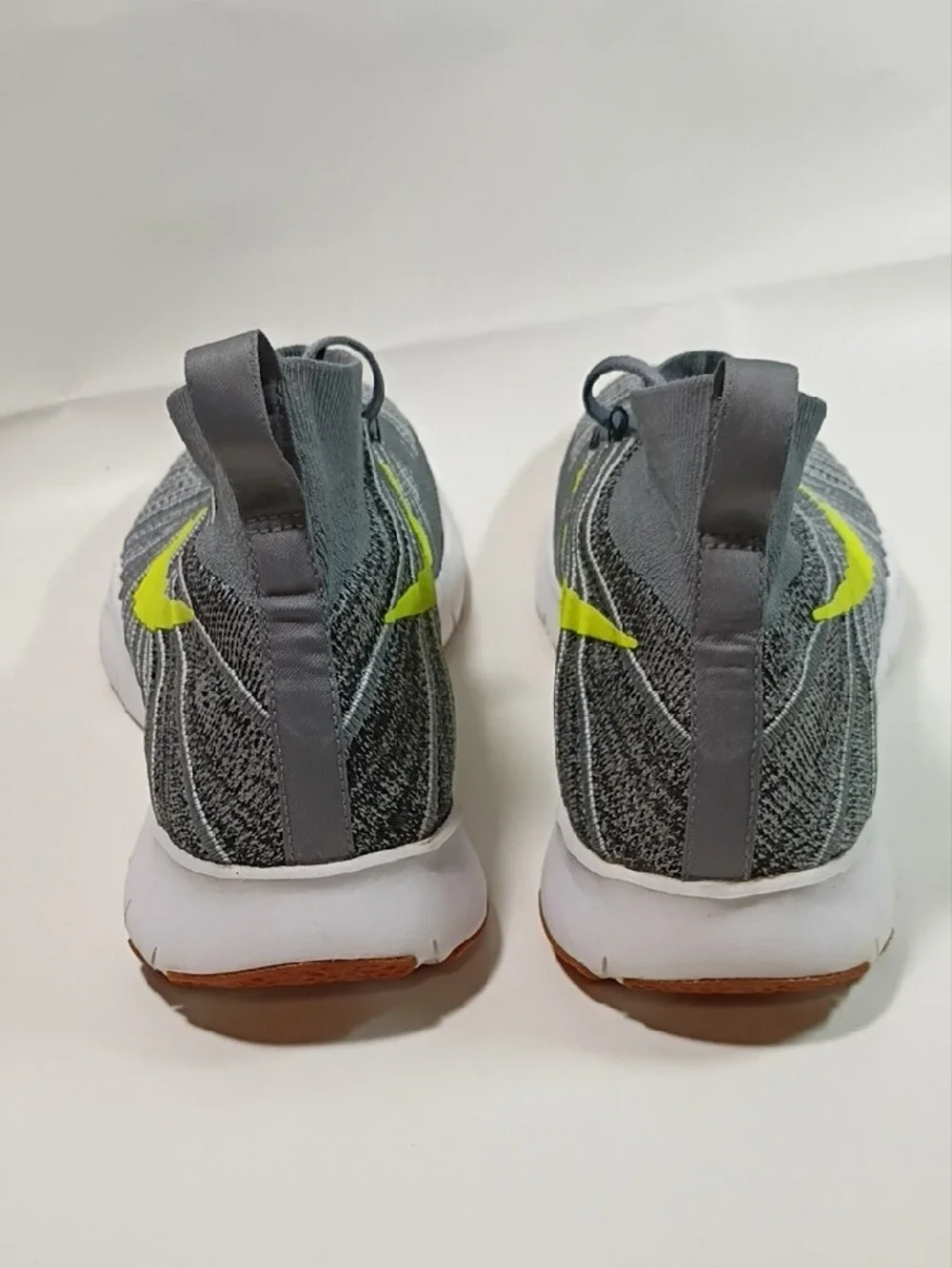 Nike Men’s Grey Flyknit Athletic Shoes with Neon Yellow Swoosh Size 10